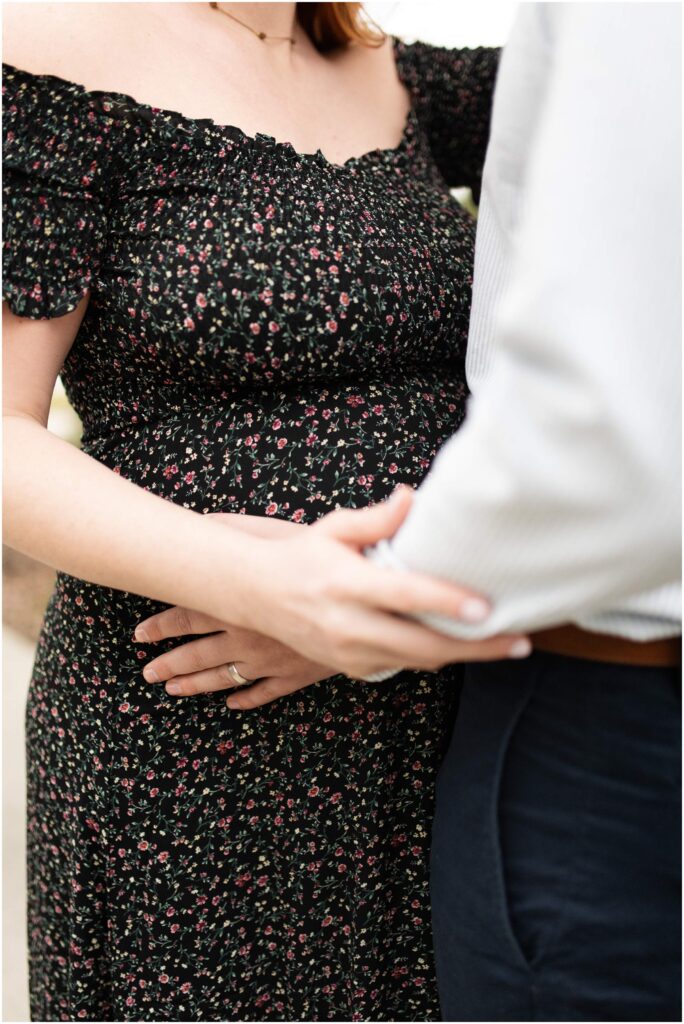 maternity session pensacola florida downtown park belly with hands