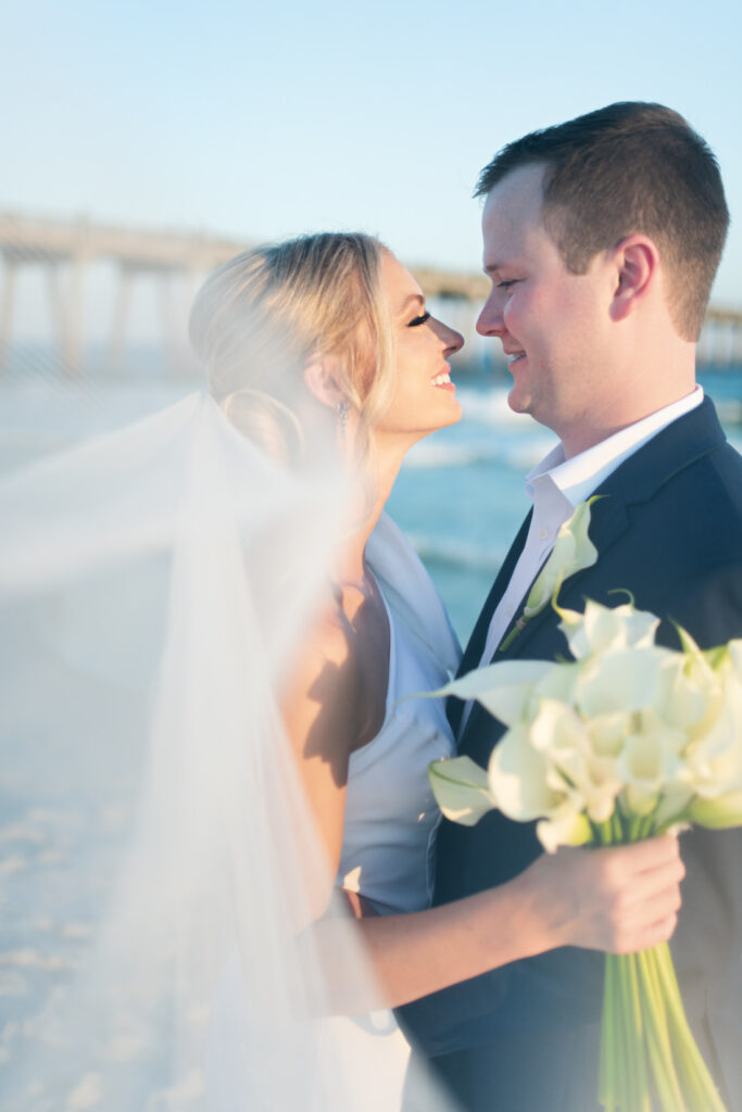 pier suite wedding pensacola beach venue veil shot bride groom