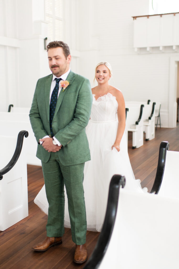 bride and groom first look chapel at seaside 30a church