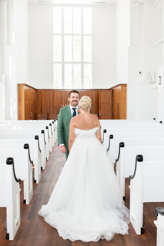 bride and groom first look chapel at seaside 30a church