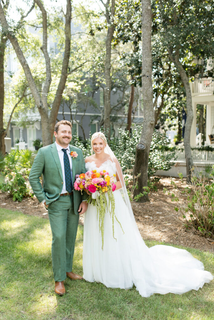 bride and groom portraits chapel at seaside 30a wedding colorful bouquet