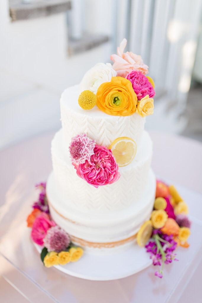 bud and alley's reception colorful boho citrus wedding cake