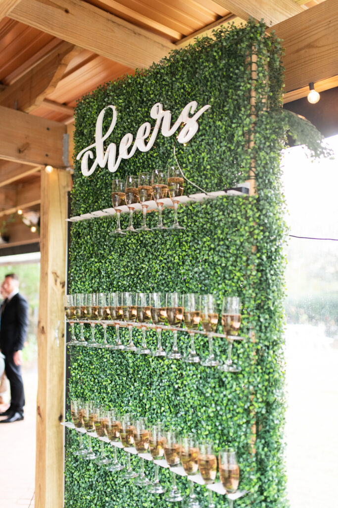military downtown elopement wedding Agapi bistro and garden champagne tower wall
